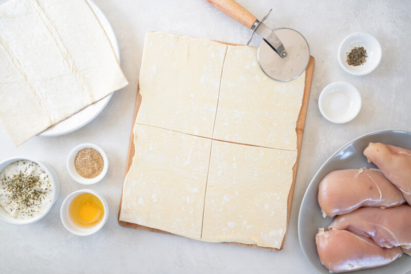 cutting puff pastry into 4 squares