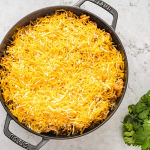 skillet pie topped with shredded cheese
