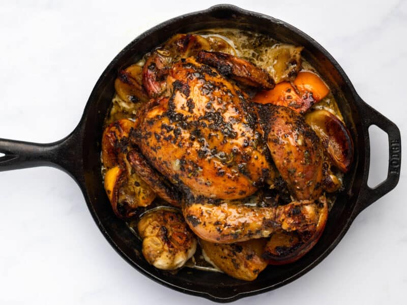 roasted christmas chicken in a cast iron skillet.