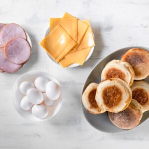overhead view of ingredients for egg mcmuffins.