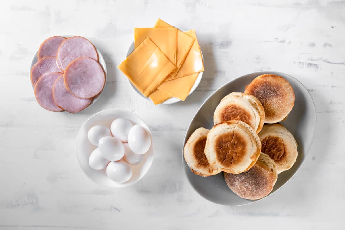 overhead view of ingredients for egg mcmuffins.