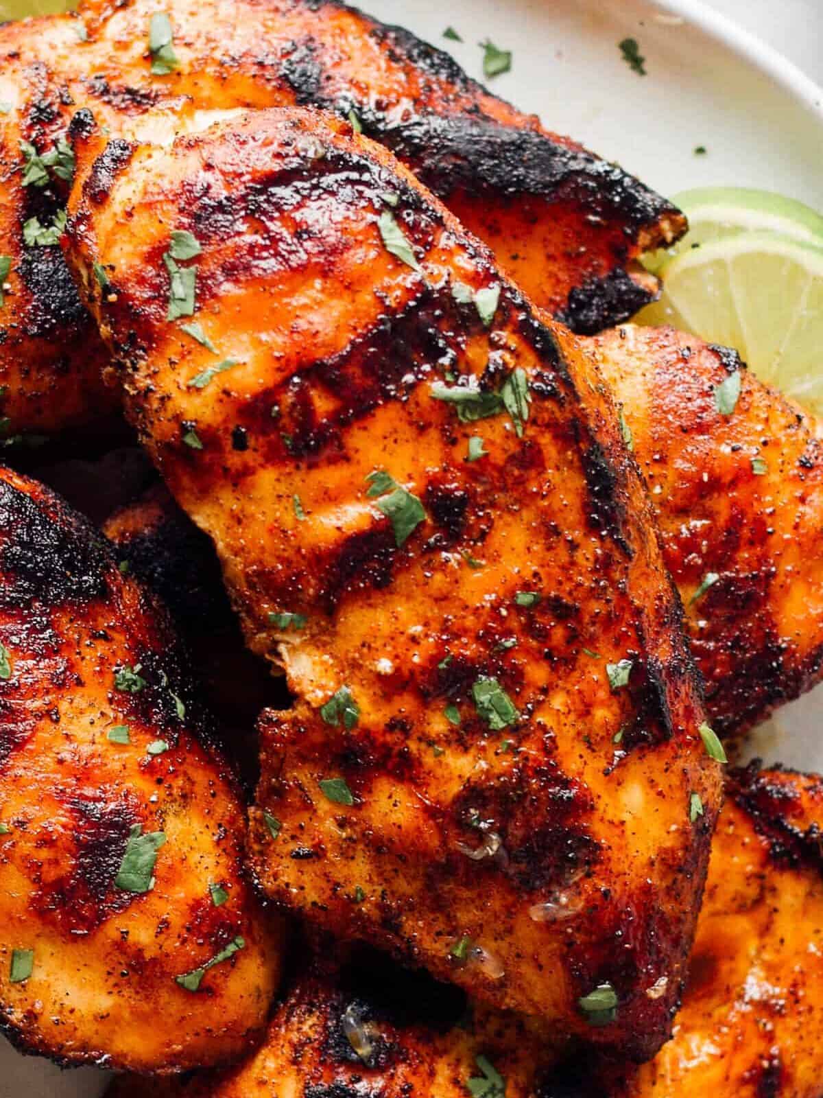 up close image of grilled chicken breast with marinade