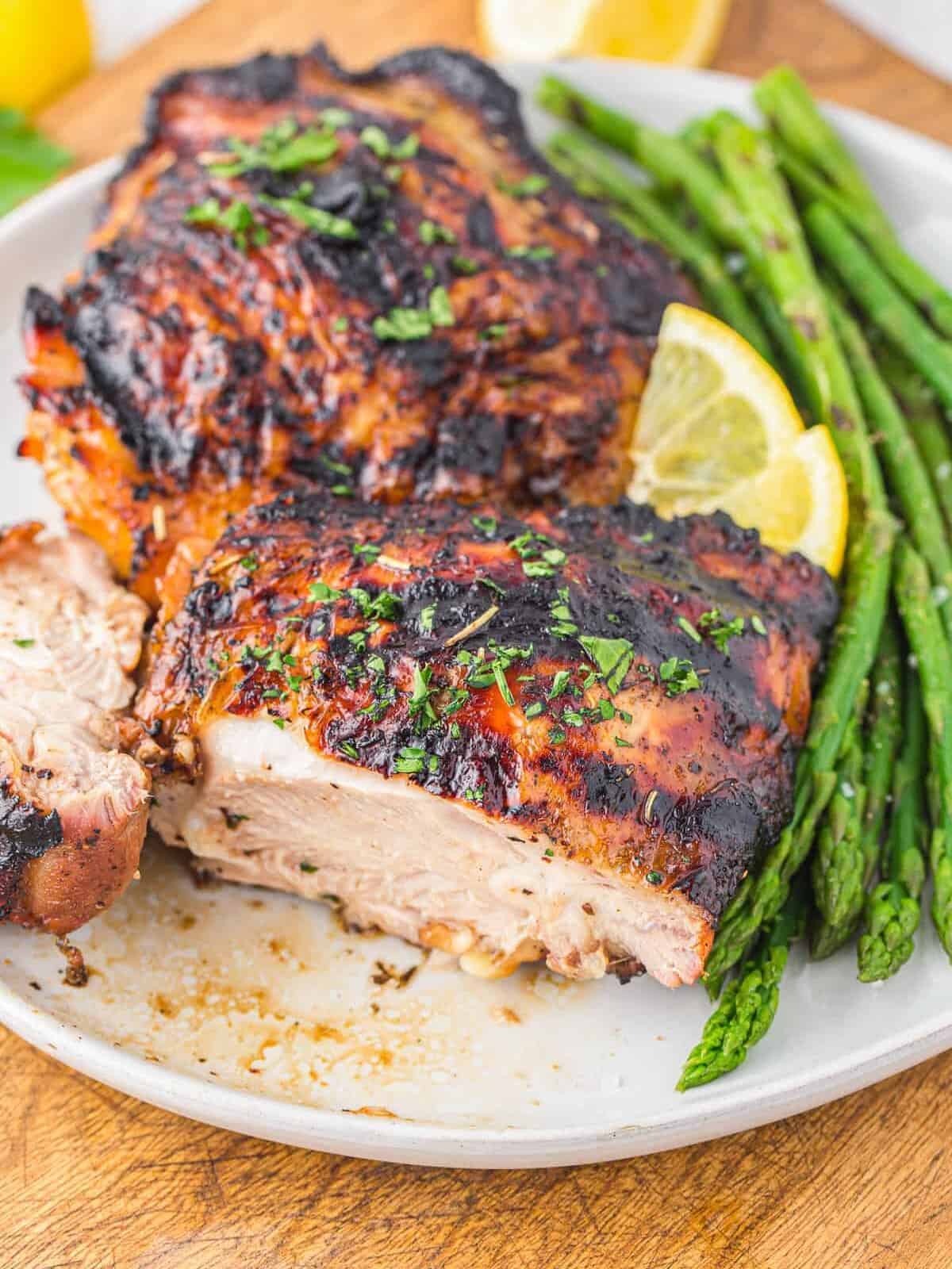 cut into grilled chicken thighs