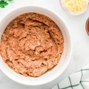 chicken meatloaf mixture in a white bowl.