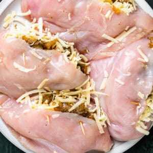 raw chicken breasts stuffed with onions and cheese.