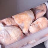 Frozen chicken defrost in refrigerator.