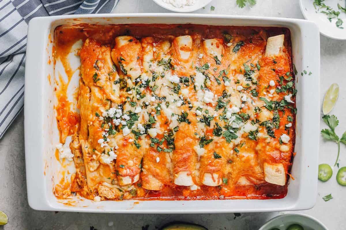 easy chicken enchiladas with one removed in baking dish