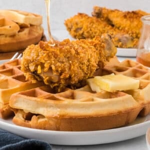 Fried chicken and waffles on a plate.