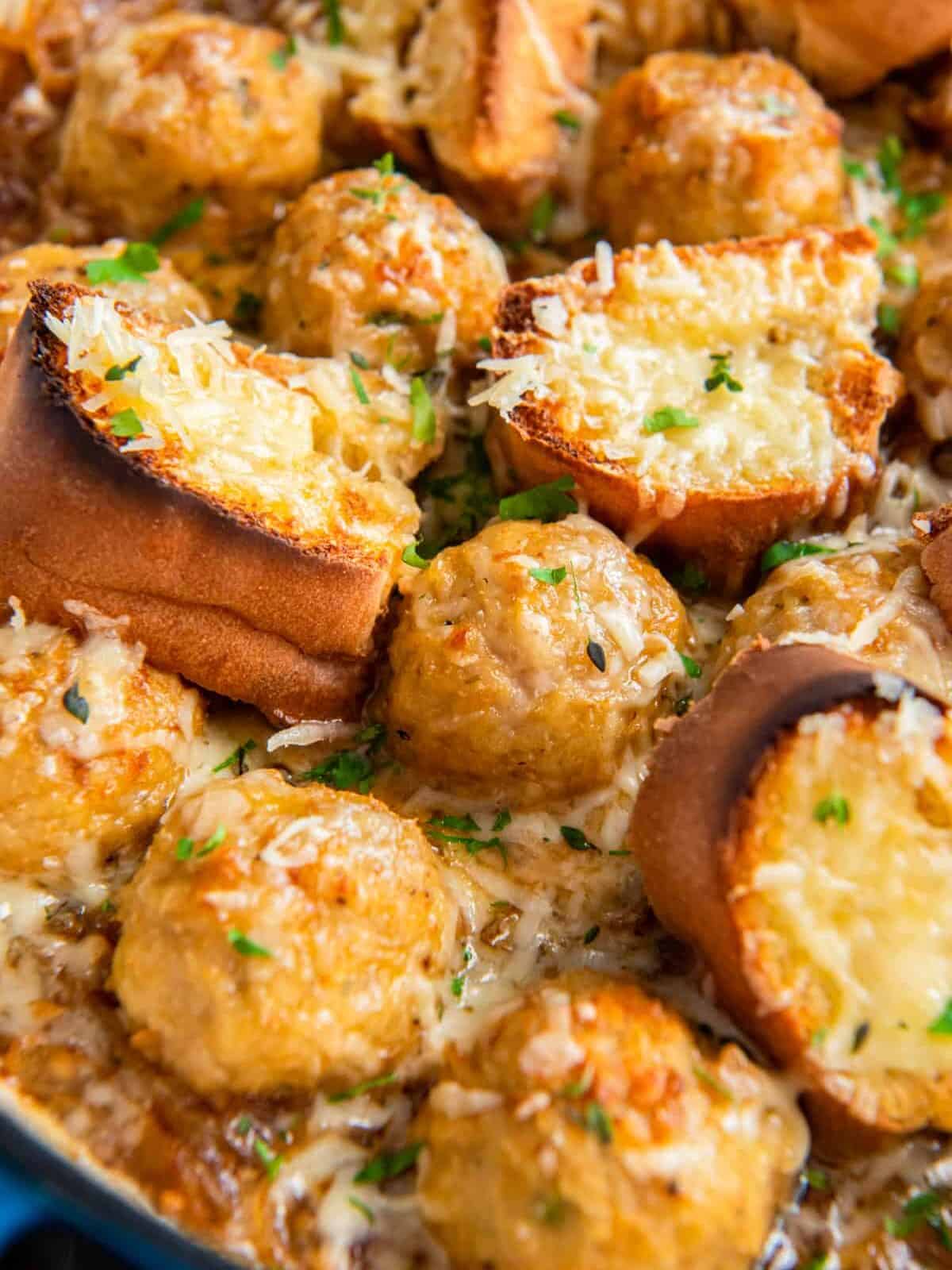close up view of french onion chicken meatballs.