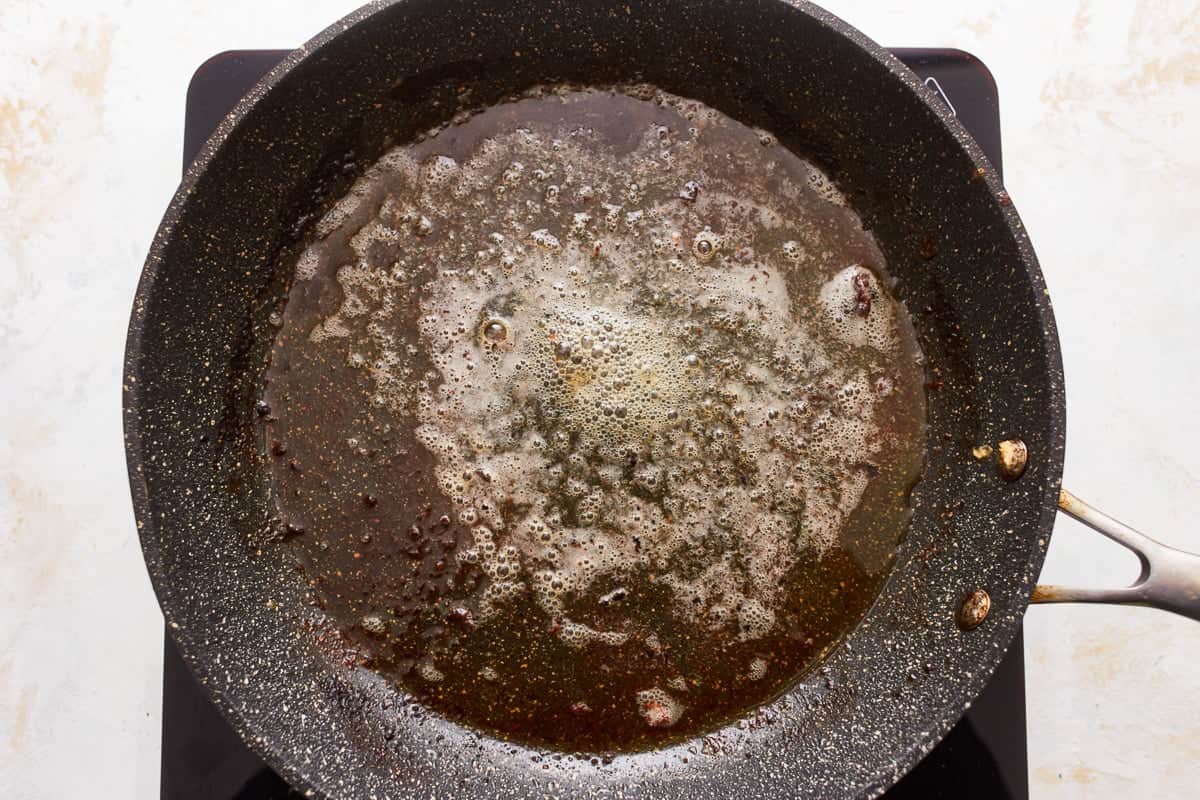 A frying pan on a stove top.
