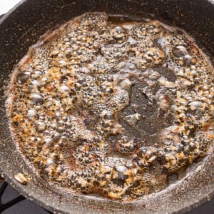 A frying pan with a lot of food in it.