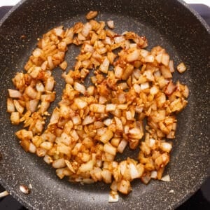 Fried onions in a frying pan.
