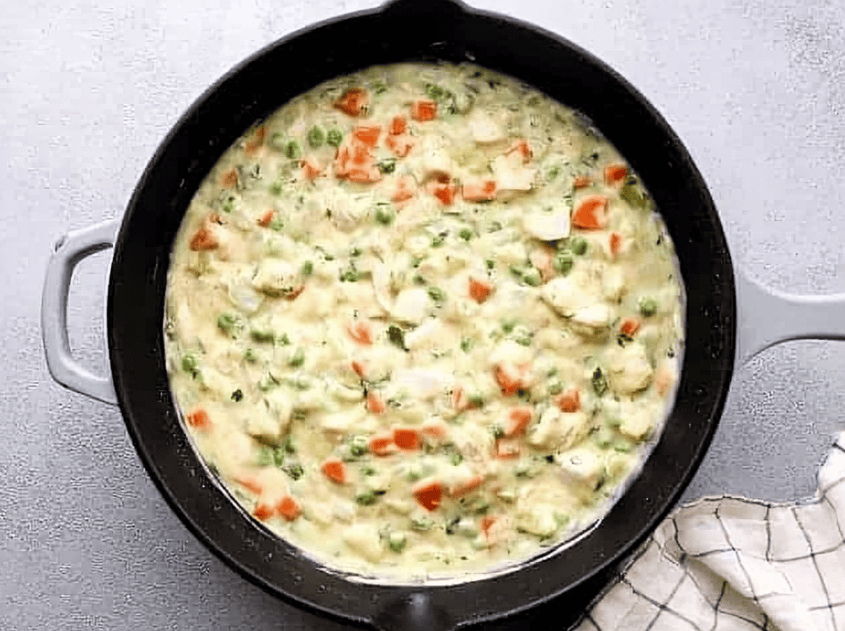 chicken pot pie filling in a pan.