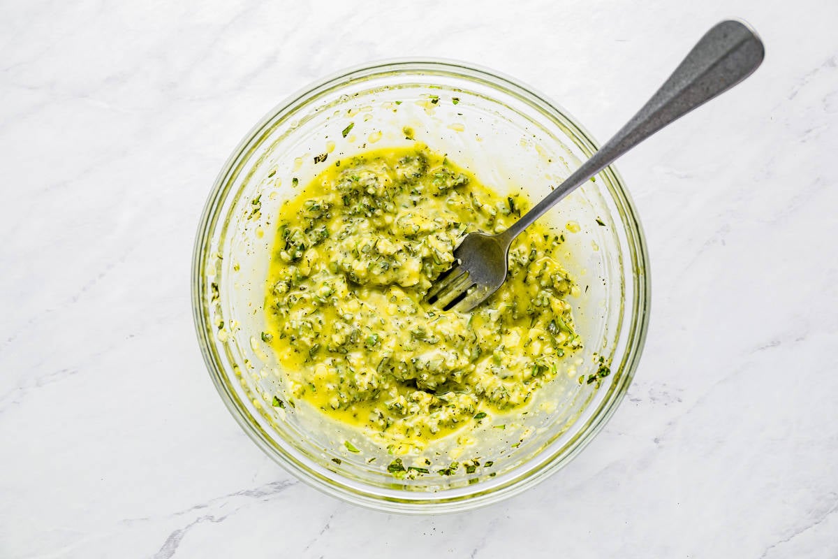 Pesto in a bowl with a fork.