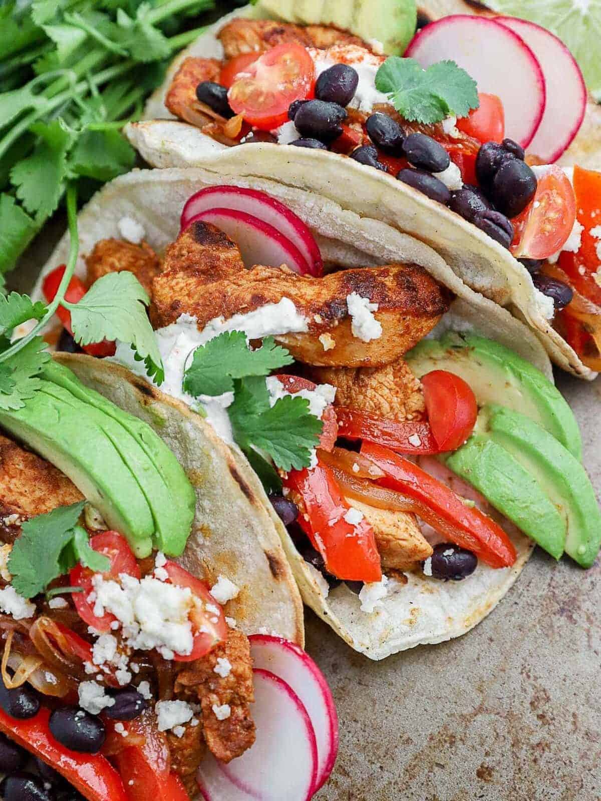 blackened chicken tacos on a plate