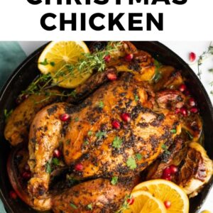 The best christmas chicken in a skillet with lemons and pomegranate.