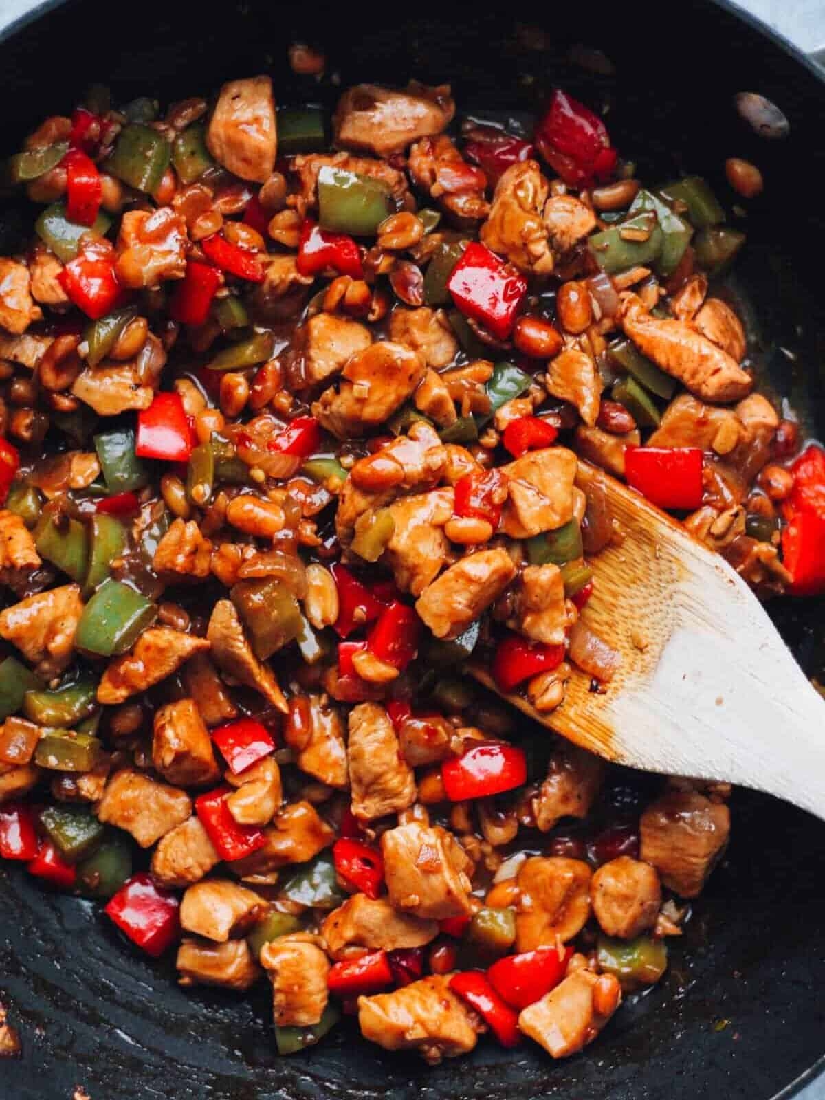 Chinese Kung Pao Chicken stir fry with peppers and onions.