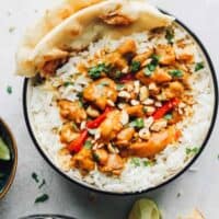 chicken curry in bowls over rice