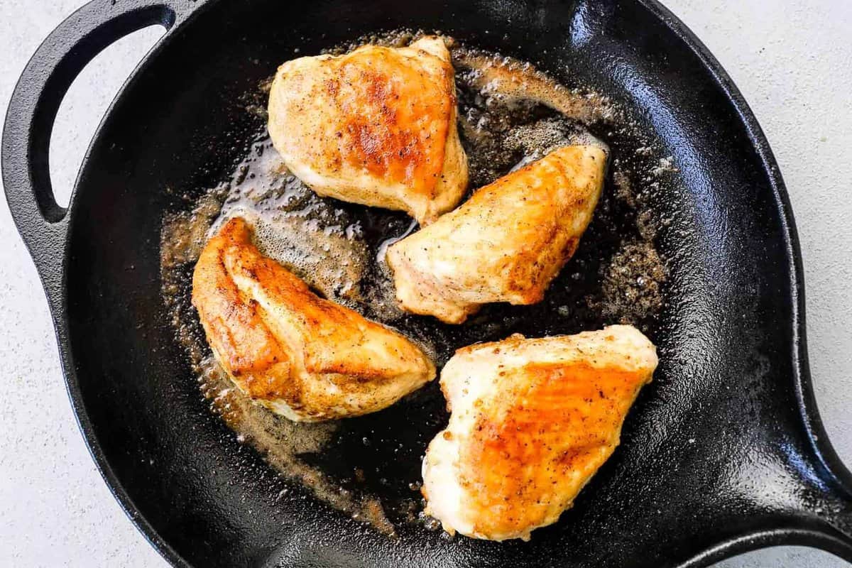 seared chicken breast in cast iron skillet