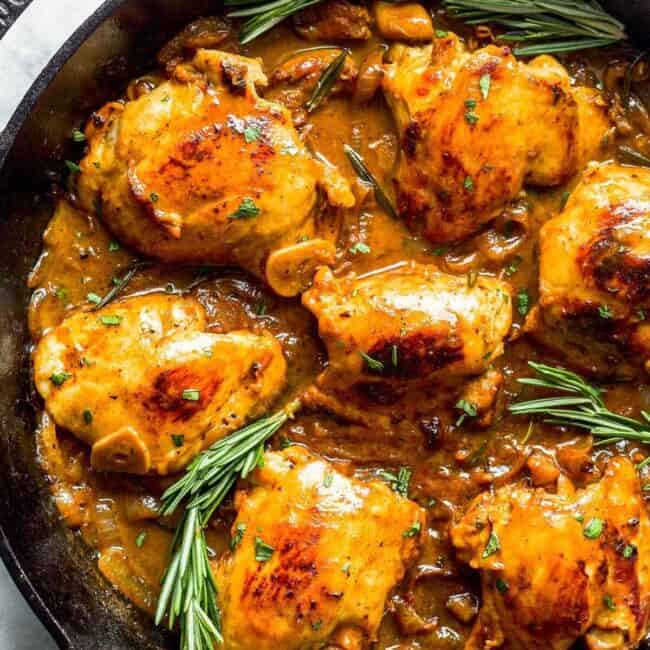 honey mustard chicken skillet garnished with rosemary