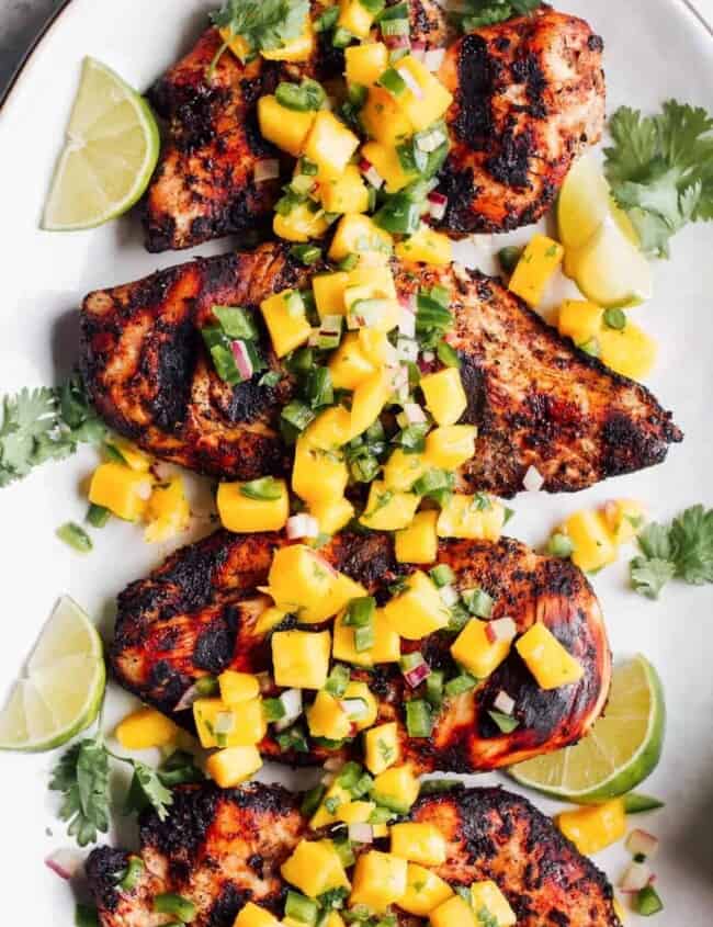 jerk chicken with pineapple salsa on platter