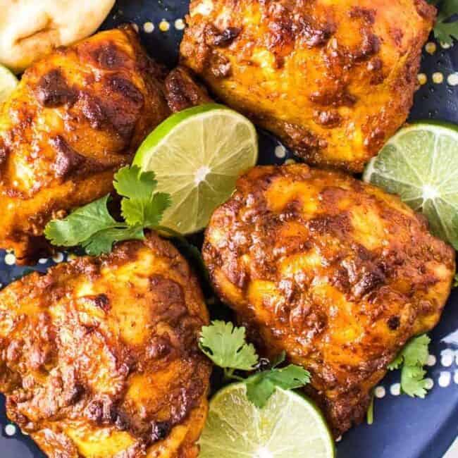 marinated tandoori chicken thighs on platter