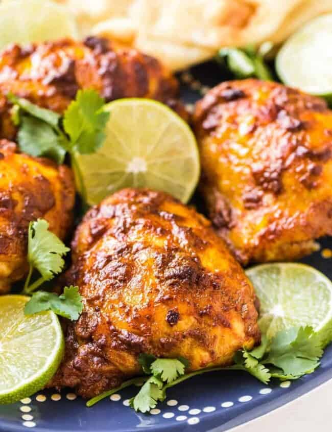 tandoori chicken on blue platter