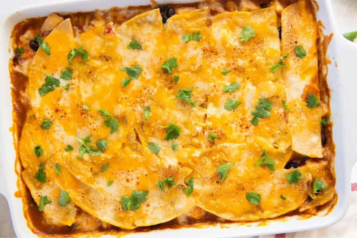 overhead view of a baked cowboy chicken casserole topped with cilantro.