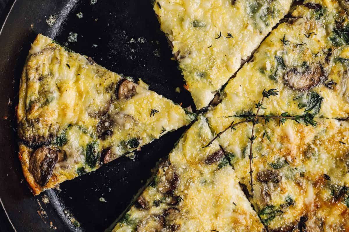 close up on a baked frittata cut into slices
