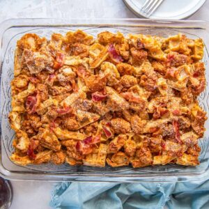 overhead view of chicken and waffle casserole in a glass rectangular baking pan.