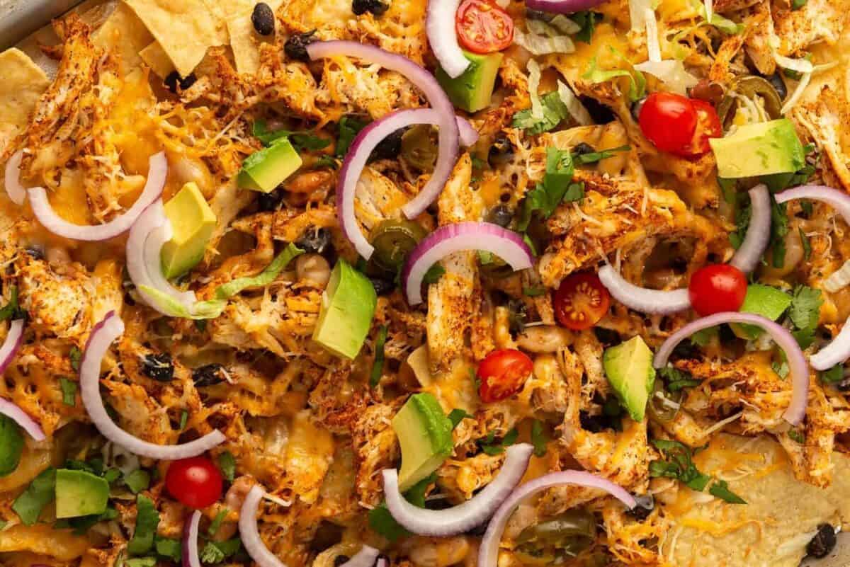 shredded chicken nachos on sheet pan