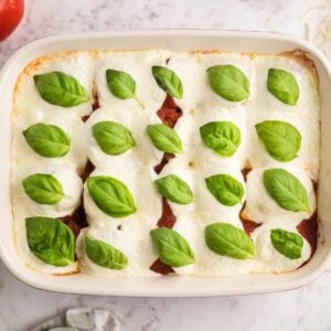 chicken parmesan meatballs in a baking dish after baking