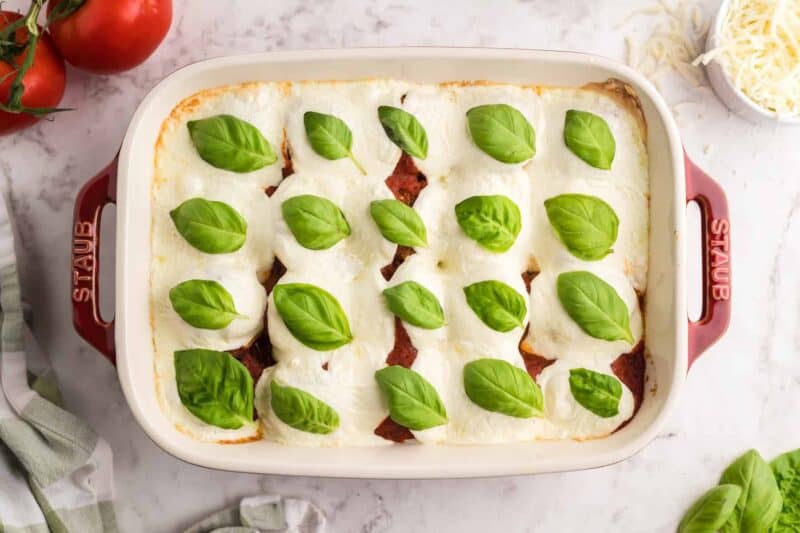 chicken parmesan meatballs in a baking dish after baking