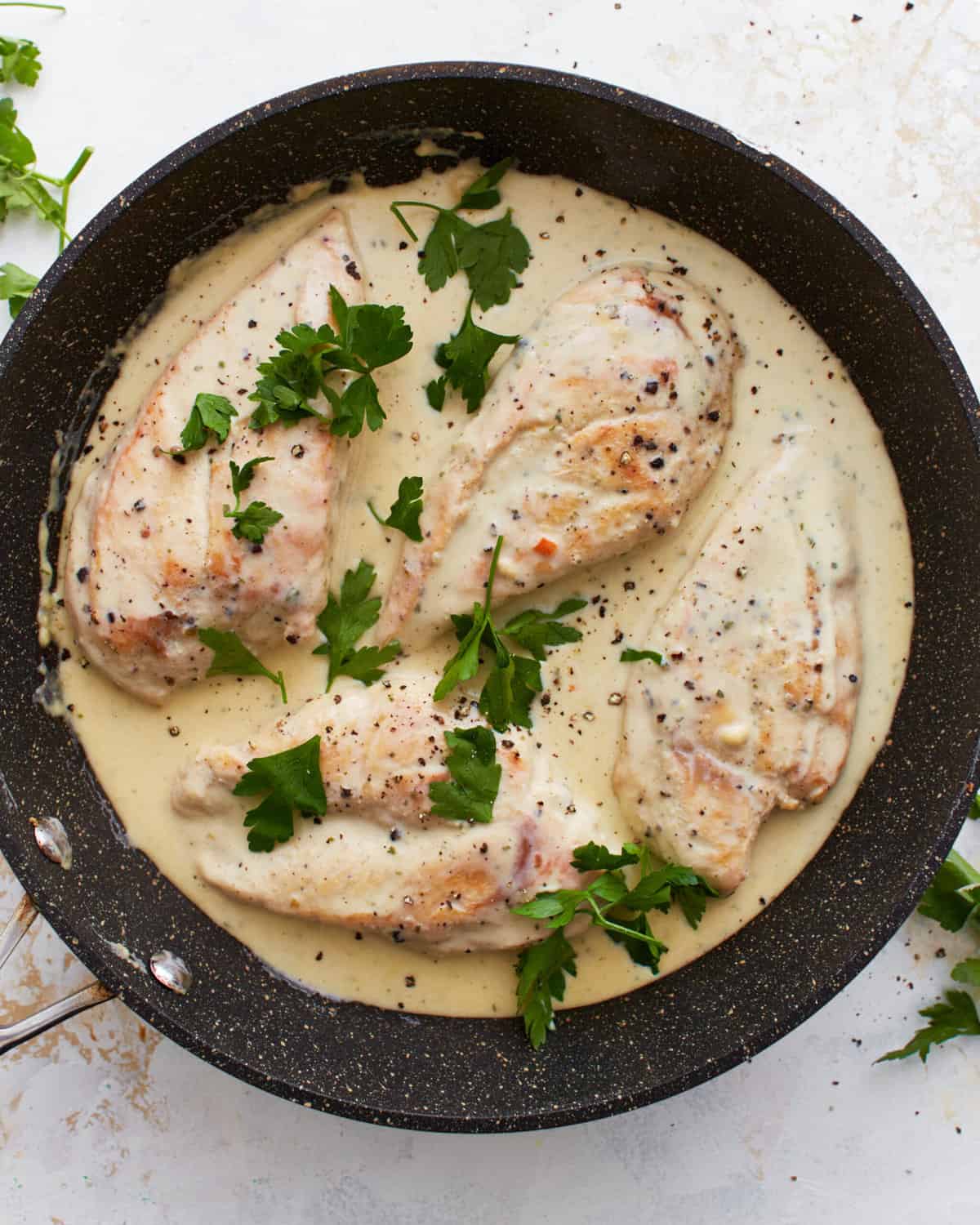 boursin chicken in a pan.