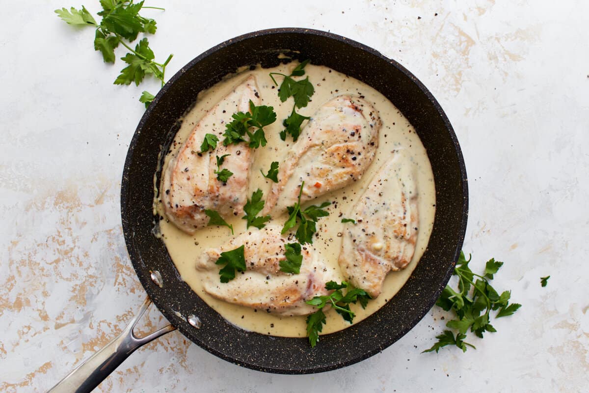 overhead view of boursin chicken in a pan.