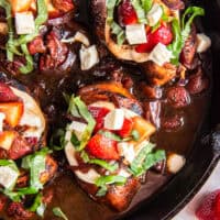 close up overhead view of strawberry balsamic chicken in a pan.