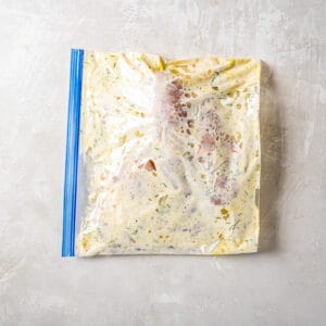 marinated chicken in a ziplock bag.