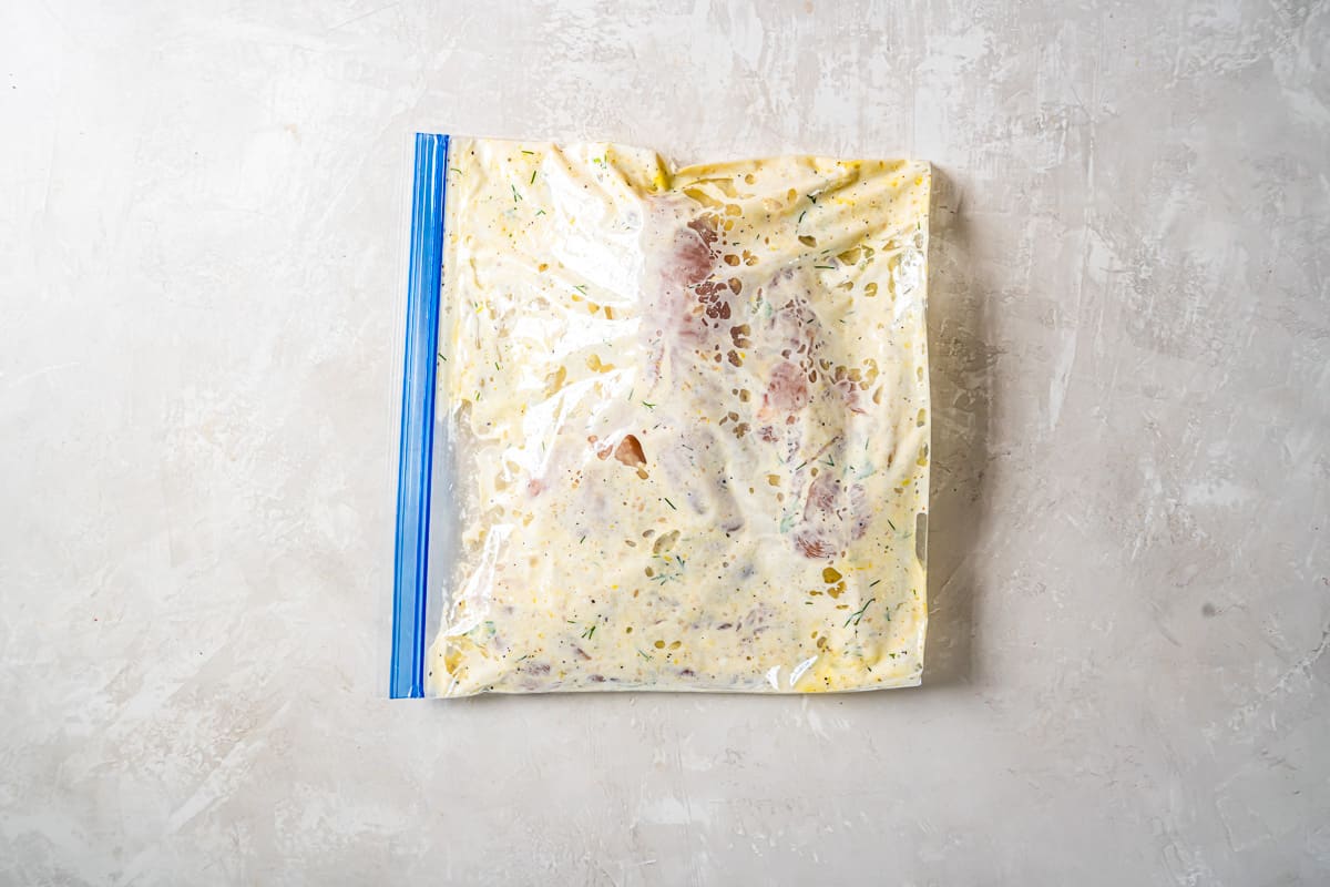 marinated chicken in a ziplock bag.