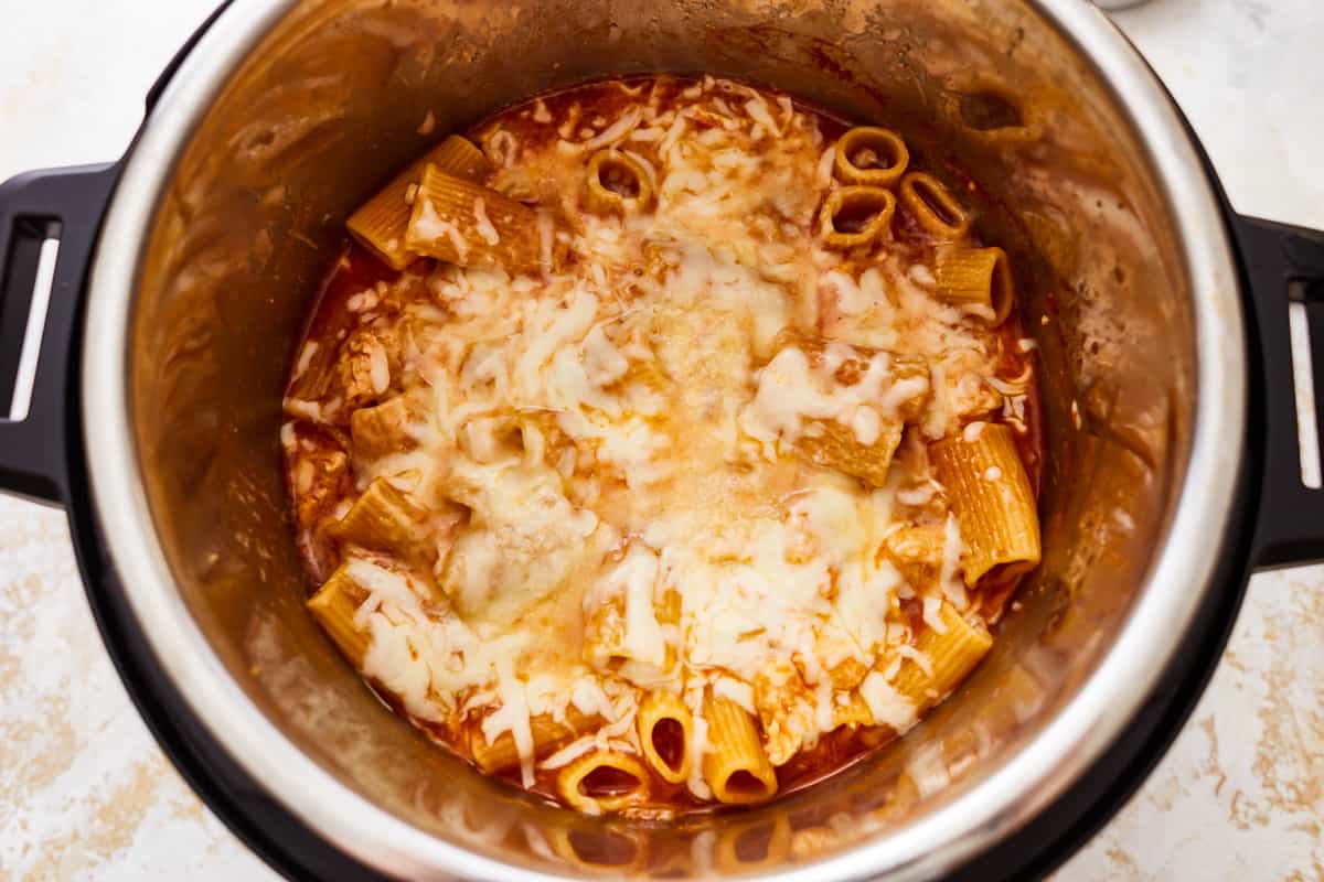 melted cheese over chicken parmesan pasta in an instant pot.