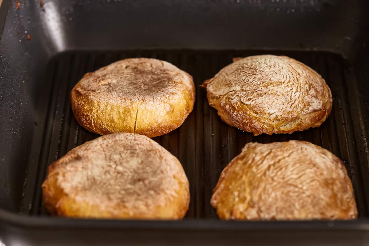 ciabatta buns on a grill.