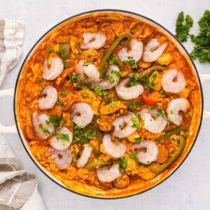 chicken paella in a pan.