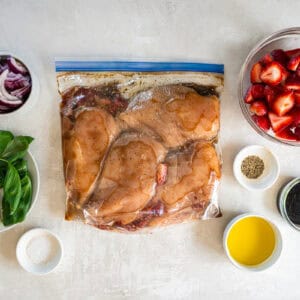 marinated chicken breasts in a ziplock bag.