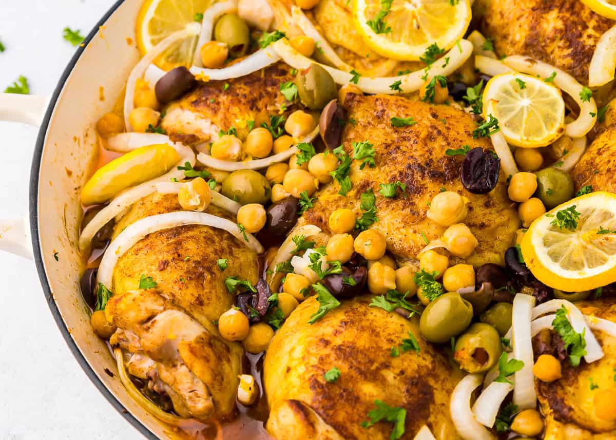 close up of moroccan chicken thighs in a pot.