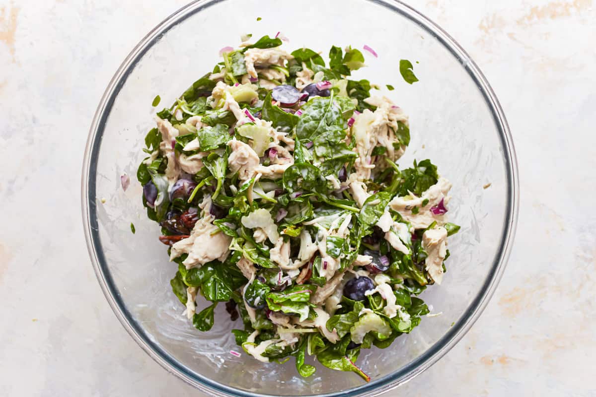 california chicken salad in a glass bowl.