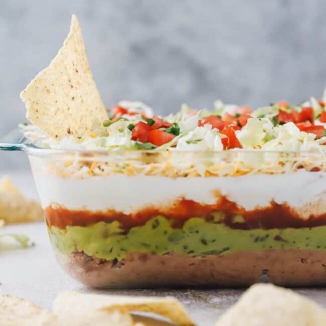 chip in layered chicken taco dip