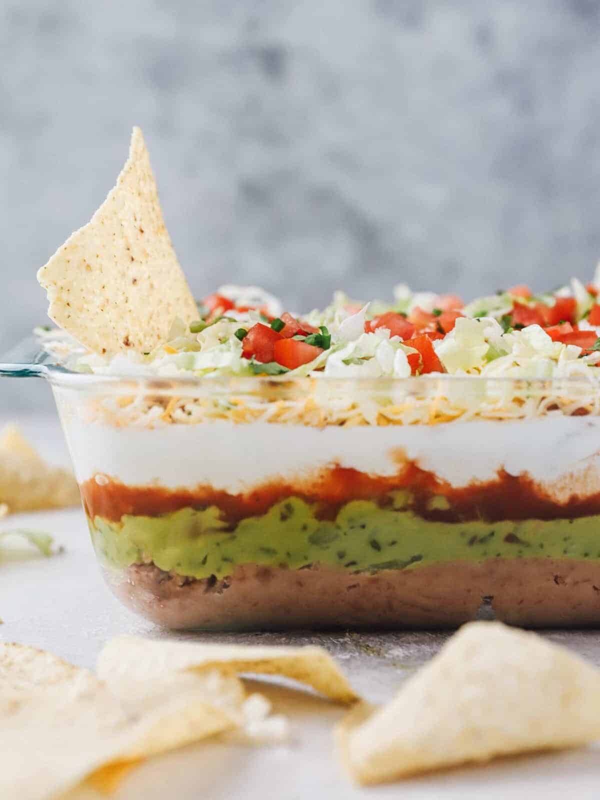 chip in layered chicken taco dip