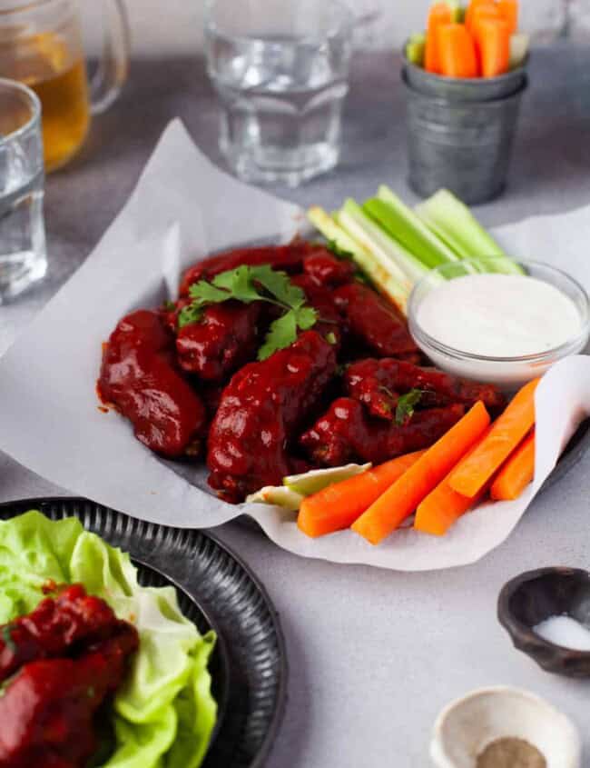 air fryer hot honey chicken wings with carrots and celery and ranch.