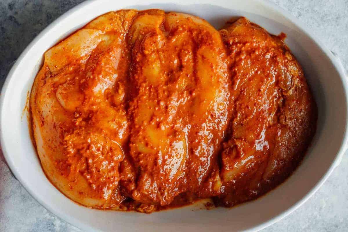 chipotle chicken breasts in baking dish