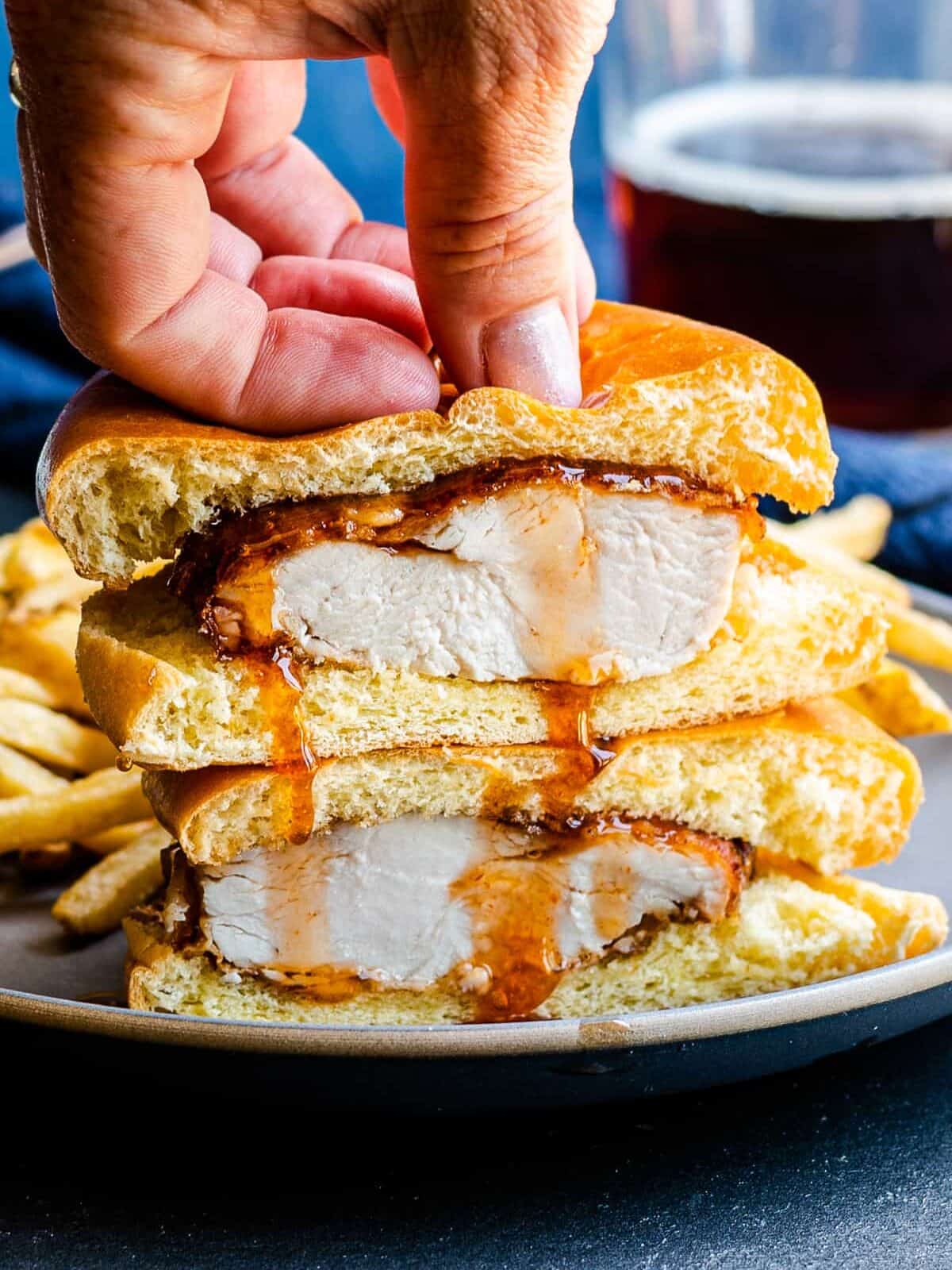 stacked beer battered chicken sandwich with hot honey