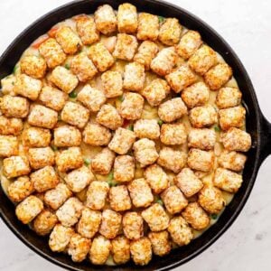 tater tots on top of skillet